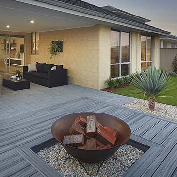 composite decking surrounding a fire pit